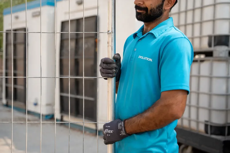 event-site-control-heras-fencing-installation-worker.webP
